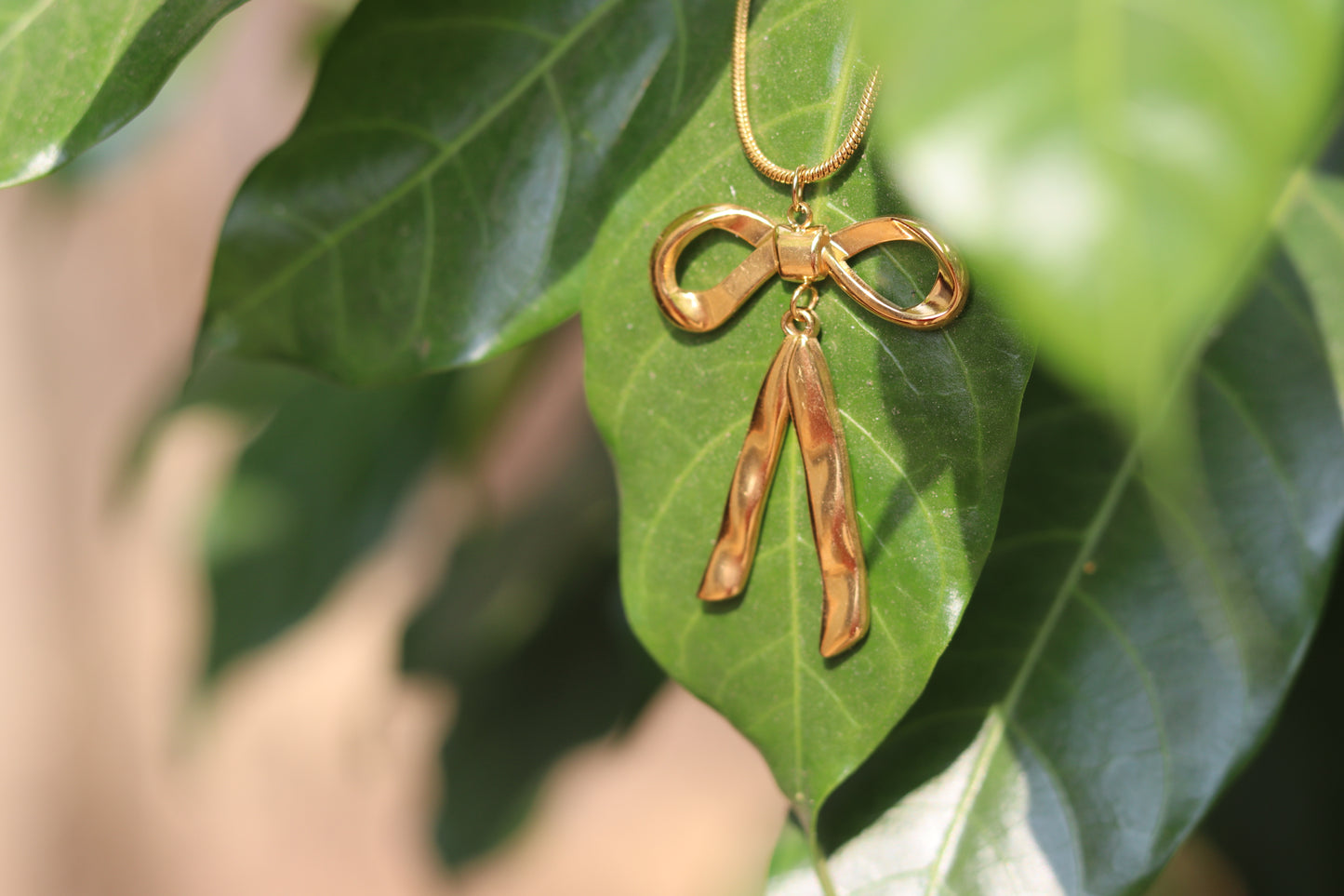 Golden Grace Long Bow Necklace